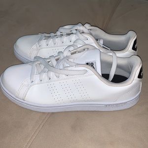 White Adidas shoes. Cloud foams.